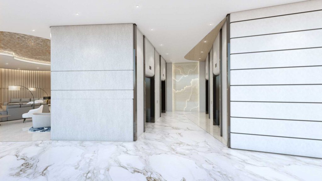 This project's elevator lobby design uses elegant curves, polished surfaces, and cool toned accents.