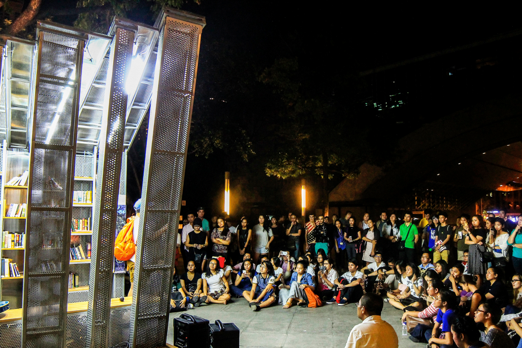 Night photo of the Open Mic Event at Book Stop, Ayala triangle