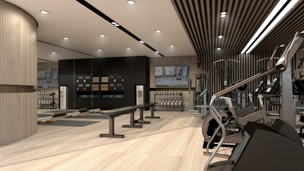 This project's indoor gym uses ash wood elements add warmth and rigidity while hints of black emphasize depth.