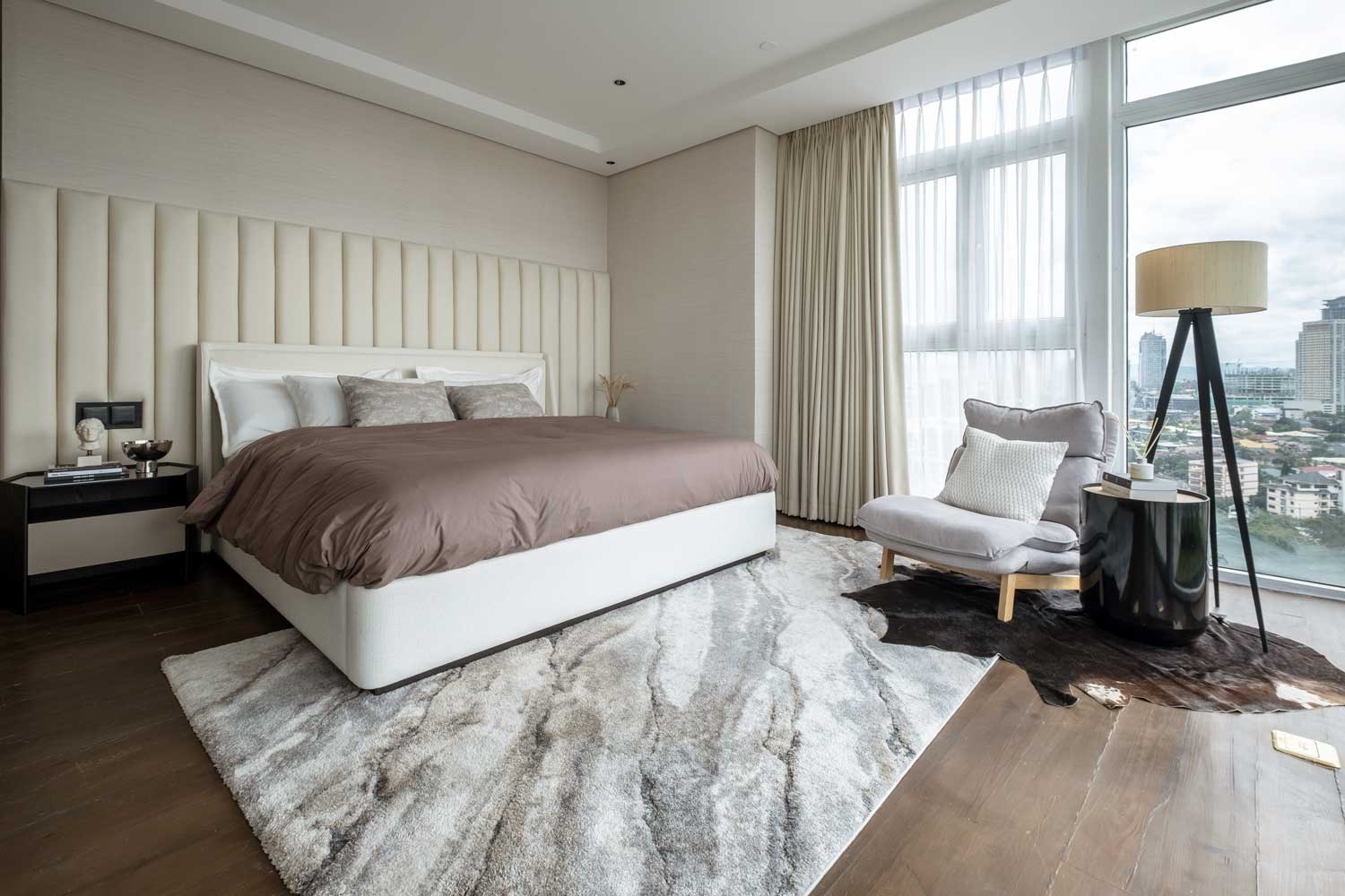 Bedroom interior design featuring a soft textures with a nude color pallette in the Twelve Luxury Flats, San Juan Manila by WTA