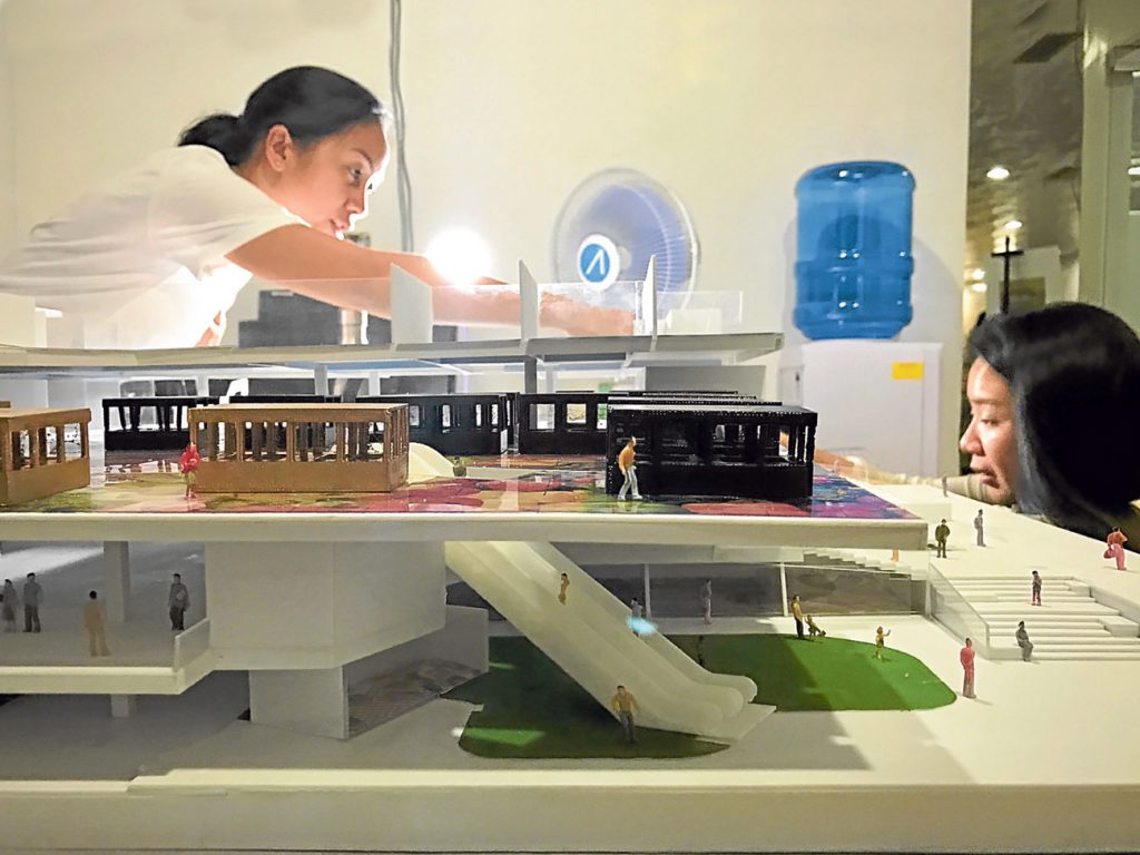 Market place scale model with architects